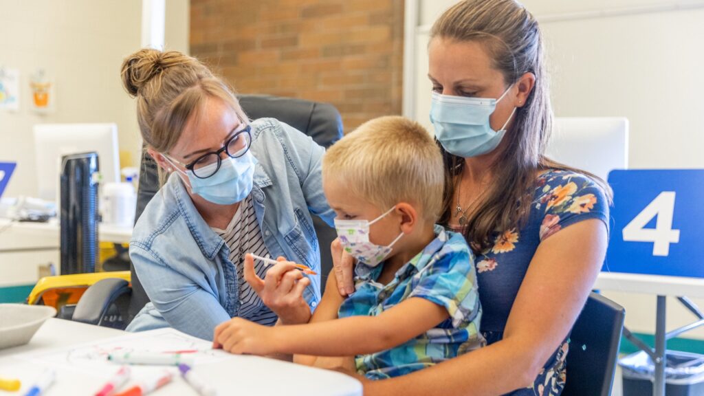 Photo of a child receiving a vaccination